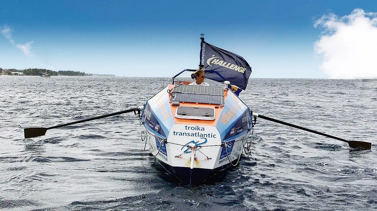 Ocean rowing boat on open Atlantic swell